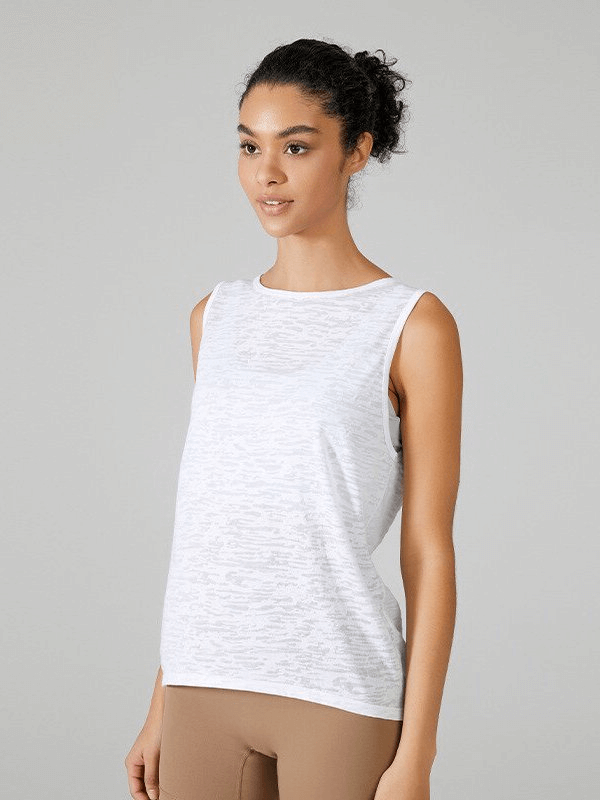 Model wearing women's sporty lightweight tank top with back cut, ideal for running, pilates, and cycling. SF1543.